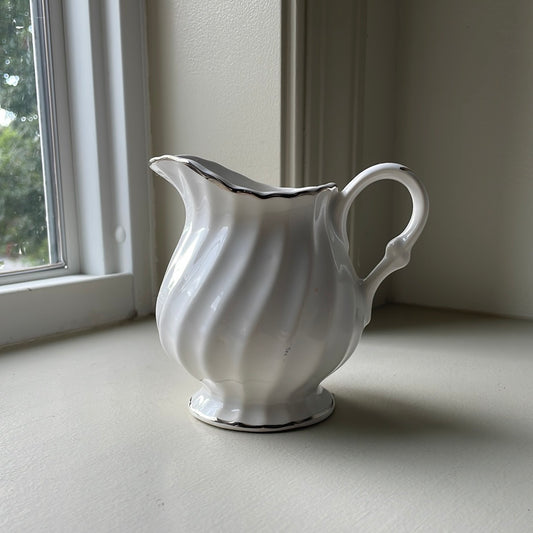 White ribbed creamer