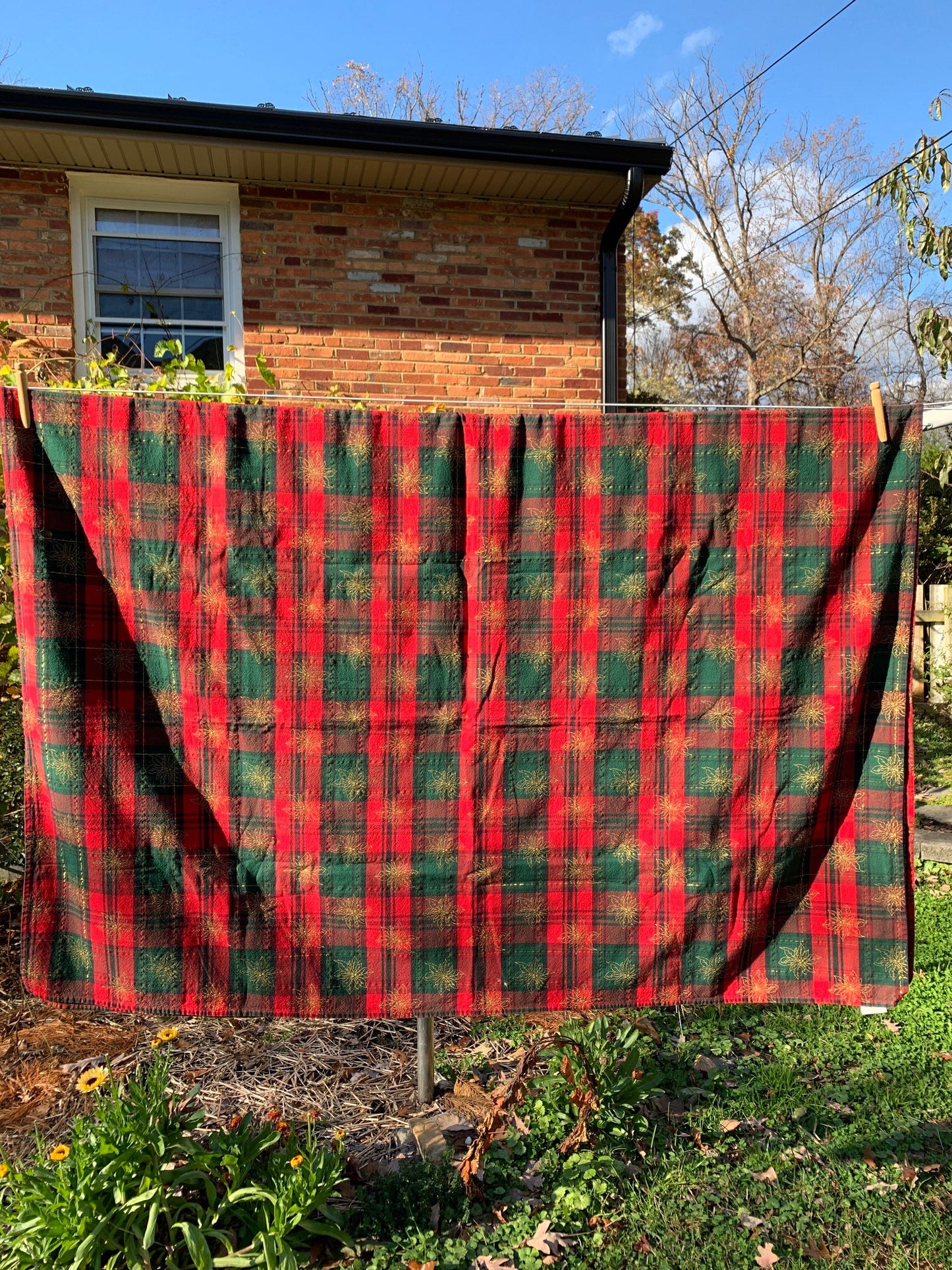 Plaid Christmas tablecloth with poinsettias