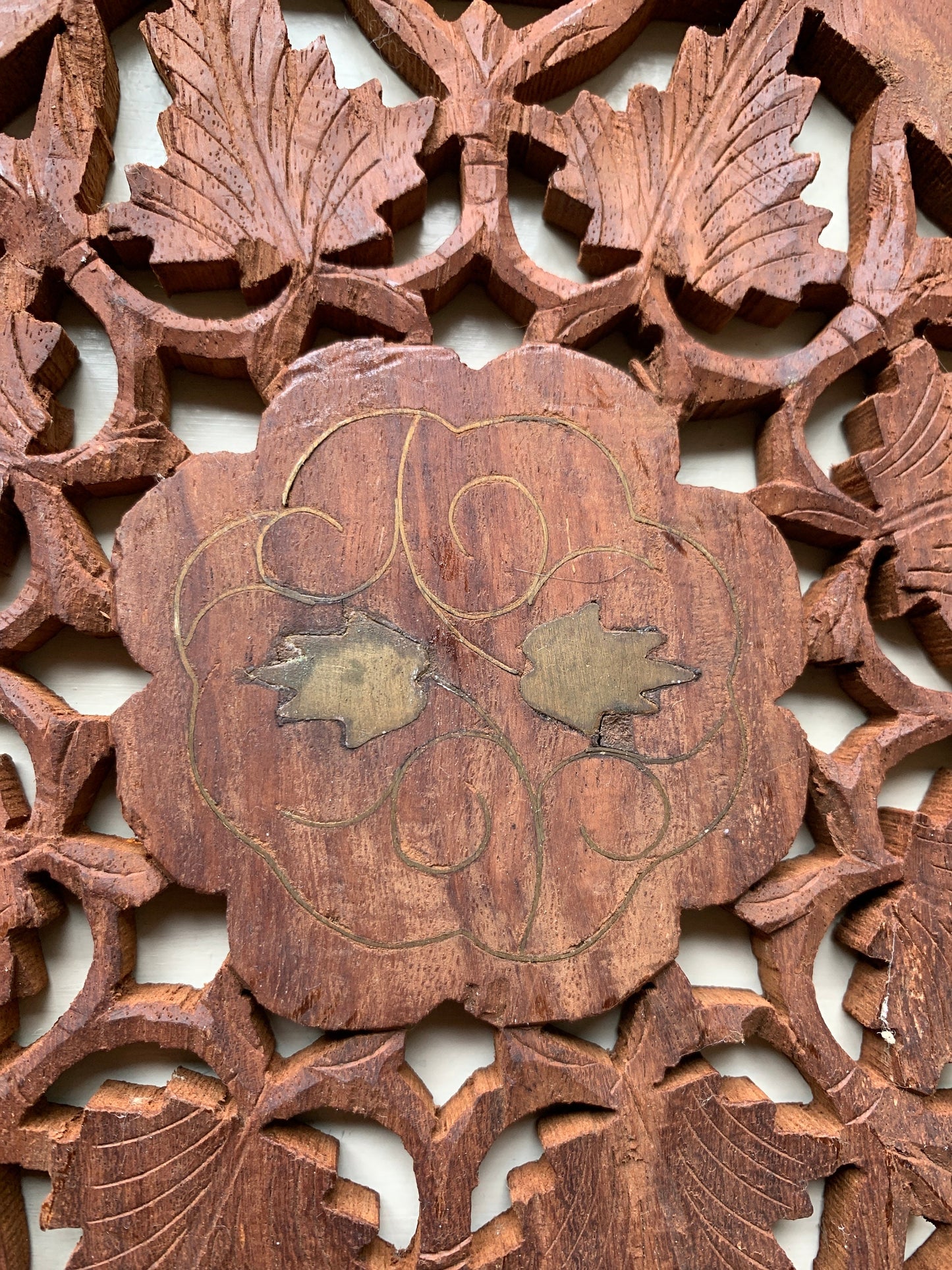 Carved wood tray with brass inlay